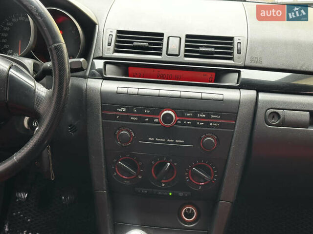 Синій Мазда 3, об'ємом двигуна 1.6 л та пробігом 258 тис. км за 2999 $, фото 9 на Automoto.ua