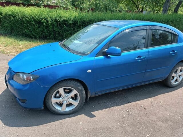 Синий Мазда 3, объемом двигателя 2 л и пробегом 238 тыс. км за 1499 $, фото 1 на Automoto.ua