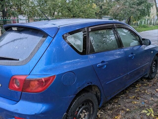 Синій Мазда 3, об'ємом двигуна 1.6 л та пробігом 292 тис. км за 1900 $, фото 5 на Automoto.ua