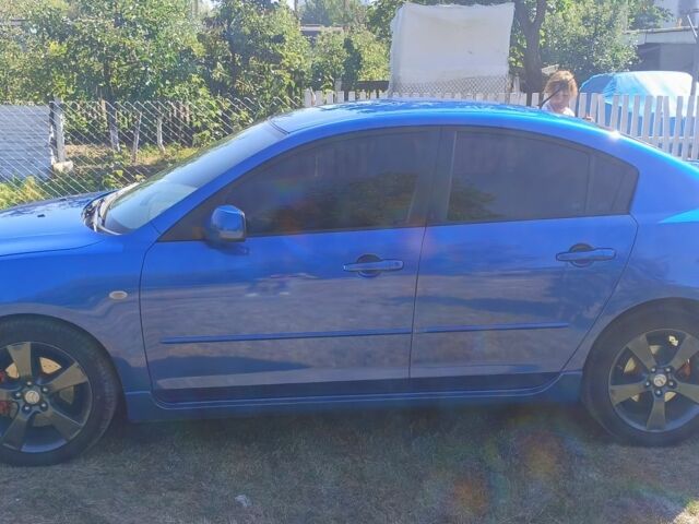 Синий Мазда 3, объемом двигателя 2 л и пробегом 215 тыс. км за 5000 $, фото 2 на Automoto.ua