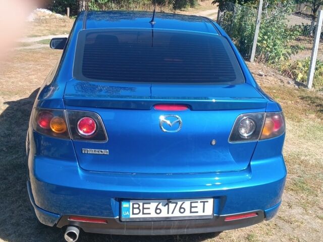 Синий Мазда 3, объемом двигателя 2 л и пробегом 215 тыс. км за 5000 $, фото 4 на Automoto.ua