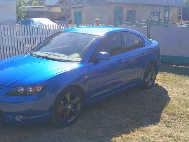 Синий Мазда 3, объемом двигателя 2 л и пробегом 215 тыс. км за 5000 $, фото 3 на Automoto.ua