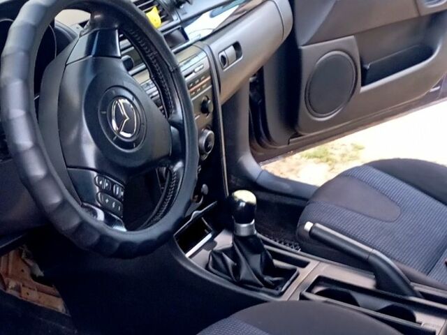 Синий Мазда 3, объемом двигателя 1.6 л и пробегом 200 тыс. км за 3300 $, фото 2 на Automoto.ua