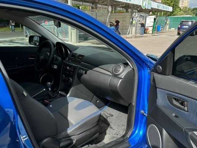 Синий Мазда 3, объемом двигателя 2 л и пробегом 202 тыс. км за 4200 $, фото 7 на Automoto.ua