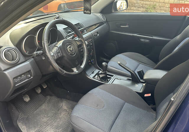 Синій Мазда 3, об'ємом двигуна 1.6 л та пробігом 243 тис. км за 4000 $, фото 7 на Automoto.ua