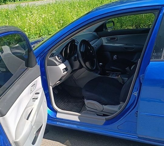Синий Мазда 3, объемом двигателя 1.4 л и пробегом 178 тыс. км за 4199 $, фото 7 на Automoto.ua