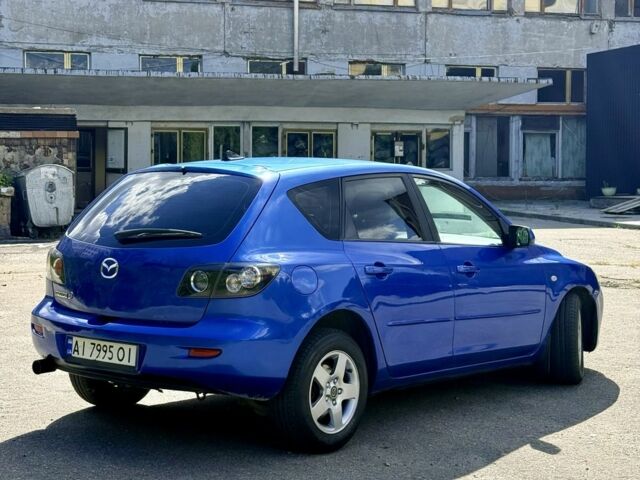 Синий Мазда 3, объемом двигателя 1.6 л и пробегом 250 тыс. км за 4199 $, фото 5 на Automoto.ua