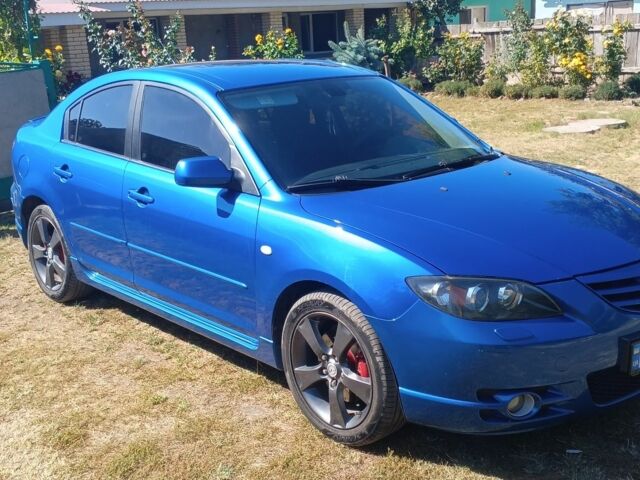 Синий Мазда 3, объемом двигателя 2 л и пробегом 215 тыс. км за 5000 $, фото 1 на Automoto.ua