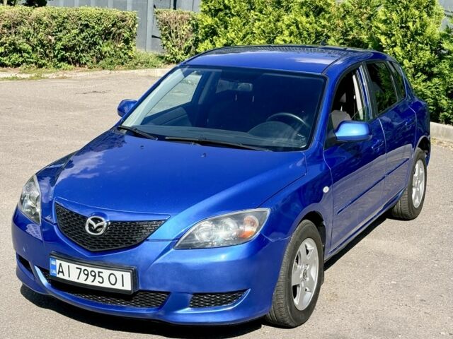 Синий Мазда 3, объемом двигателя 1.6 л и пробегом 250 тыс. км за 4199 $, фото 12 на Automoto.ua