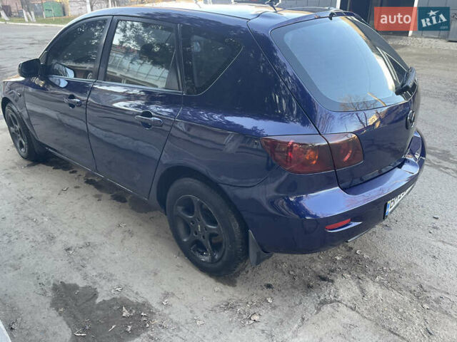 Синій Мазда 3, об'ємом двигуна 1.56 л та пробігом 320 тис. км за 5100 $, фото 4 на Automoto.ua