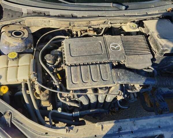 Синий Мазда 3, объемом двигателя 1.6 л и пробегом 220 тыс. км за 3750 $, фото 11 на Automoto.ua
