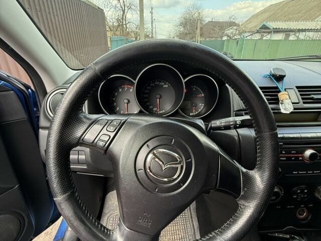 Синий Мазда 3, объемом двигателя 1.6 л и пробегом 279 тыс. км за 3500 $, фото 4 на Automoto.ua
