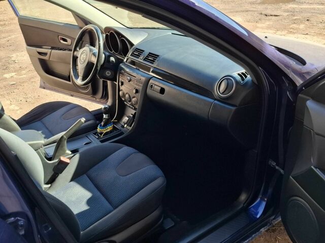 Синій Мазда 3, об'ємом двигуна 1.6 л та пробігом 288 тис. км за 3900 $, фото 9 на Automoto.ua
