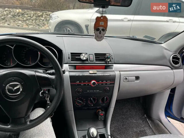 Синий Мазда 3, объемом двигателя 1.35 л и пробегом 182 тыс. км за 3400 $, фото 12 на Automoto.ua