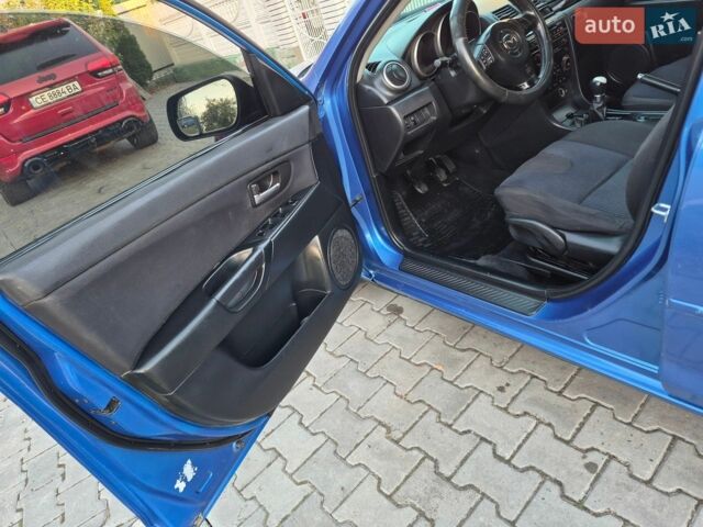 Синій Мазда 3, об'ємом двигуна 1.6 л та пробігом 233 тис. км за 3100 $, фото 30 на Automoto.ua