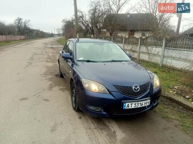Синій Мазда 3, об'ємом двигуна 1.35 л та пробігом 260 тис. км за 2500 $, фото 1 на Automoto.ua