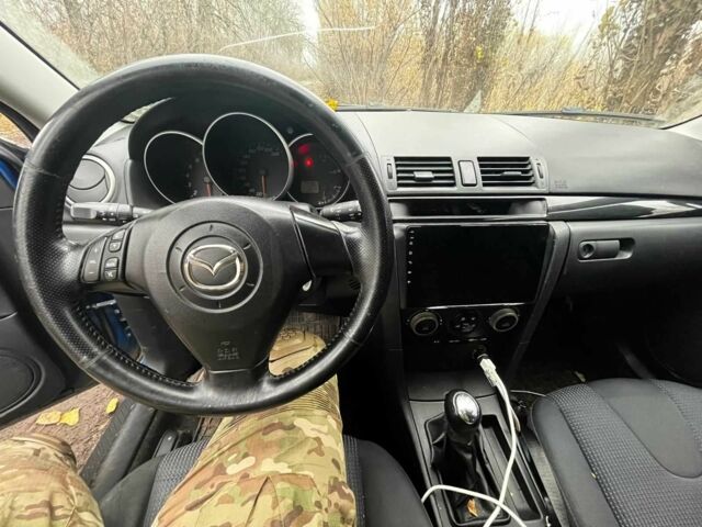 Синий Мазда 3, объемом двигателя 1.6 л и пробегом 240 тыс. км за 3207 $, фото 2 на Automoto.ua