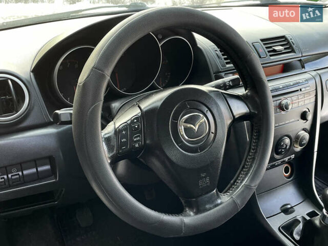 Синій Мазда 3, об'ємом двигуна 1.4 л та пробігом 190 тис. км за 2950 $, фото 16 на Automoto.ua
