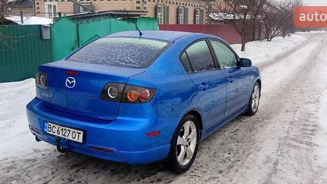 Синий Мазда 3, объемом двигателя 2.26 л и пробегом 212 тыс. км за 4600 $, фото 4 на Automoto.ua