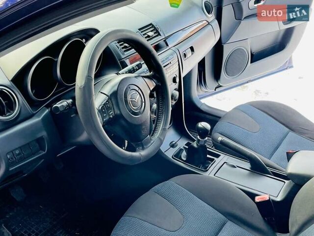 Синій Мазда 3, об'ємом двигуна 1.4 л та пробігом 190 тис. км за 2950 $, фото 9 на Automoto.ua