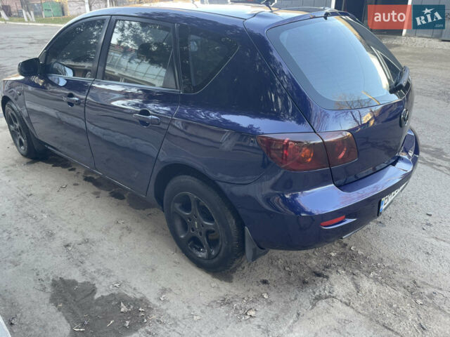 Синій Мазда 3, об'ємом двигуна 1.56 л та пробігом 320 тис. км за 4600 $, фото 4 на Automoto.ua