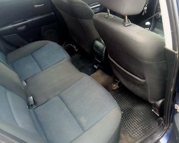 Синій Мазда 3, об'ємом двигуна 1.35 л та пробігом 260 тис. км за 2500 $, фото 7 на Automoto.ua