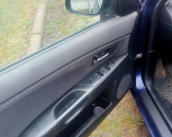 Синій Мазда 3, об'ємом двигуна 1.35 л та пробігом 260 тис. км за 2500 $, фото 5 на Automoto.ua