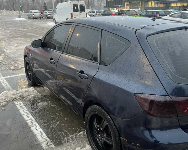 Синий Мазда 3, объемом двигателя 1.35 л и пробегом 264 тыс. км за 3250 $, фото 3 на Automoto.ua