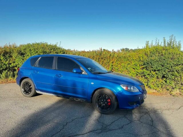 Синий Мазда 3, объемом двигателя 1.6 л и пробегом 240 тыс. км за 3207 $, фото 1 на Automoto.ua