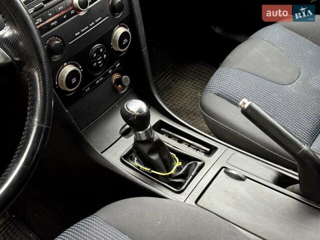 Синий Мазда 3, объемом двигателя 1.6 л и пробегом 287 тыс. км за 2100 $, фото 5 на Automoto.ua