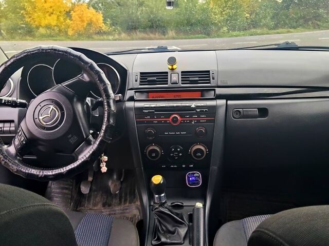 Синій Мазда 3, об'ємом двигуна 1.6 л та пробігом 372 тис. км за 4600 $, фото 4 на Automoto.ua
