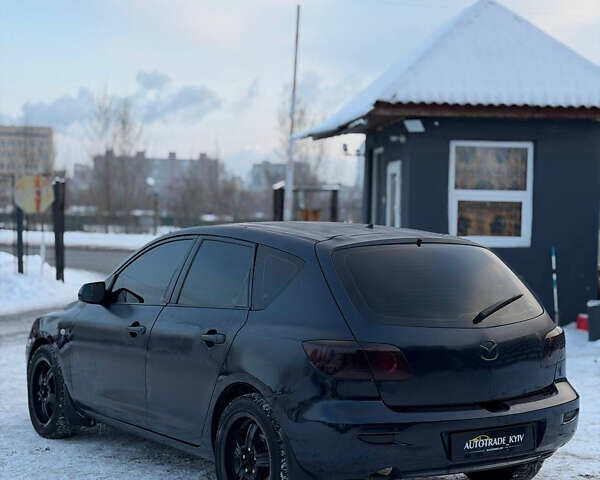 Синий Мазда 3, объемом двигателя 1.3 л и пробегом 222 тыс. км за 2500 $, фото 3 на Automoto.ua