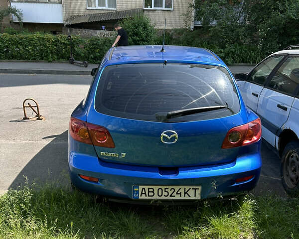 Синий Мазда 3, объемом двигателя 1.35 л и пробегом 170 тыс. км за 3900 $, фото 3 на Automoto.ua