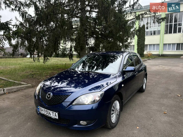 Синий Мазда 3, объемом двигателя 1.6 л и пробегом 237 тыс. км за 3950 $, фото 6 на Automoto.ua