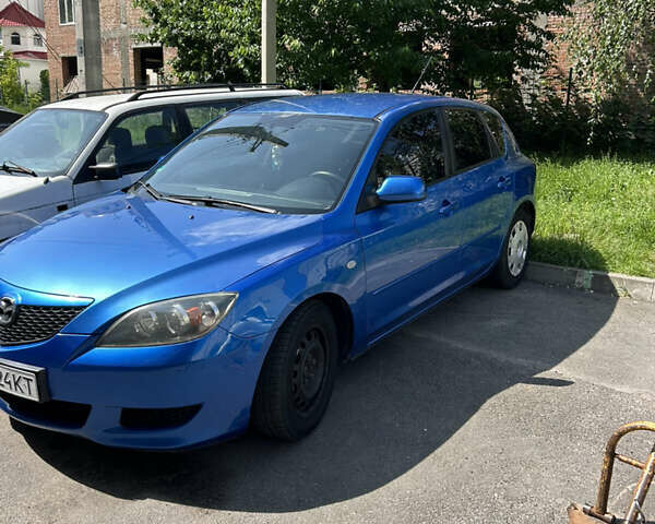 Синий Мазда 3, объемом двигателя 1.35 л и пробегом 170 тыс. км за 3900 $, фото 2 на Automoto.ua