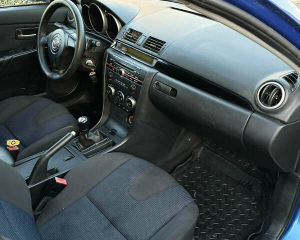 Синій Мазда 3, об'ємом двигуна 1.6 л та пробігом 289 тис. км за 3699 $, фото 14 на Automoto.ua