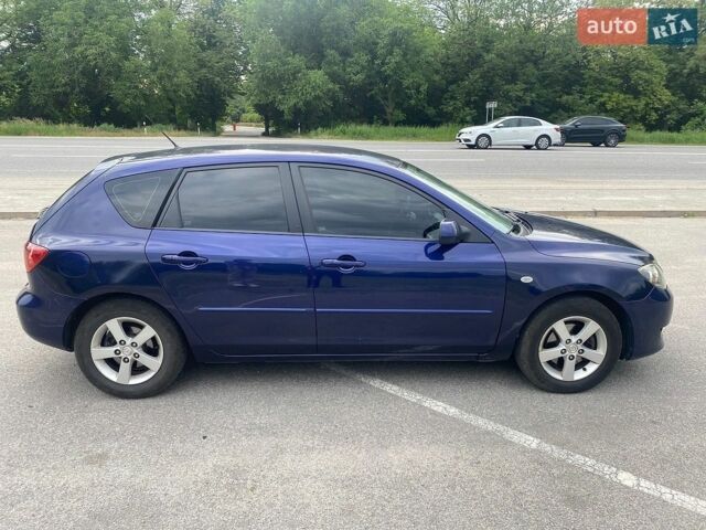 Синий Мазда 3, объемом двигателя 1.6 л и пробегом 230 тыс. км за 3800 $, фото 3 на Automoto.ua