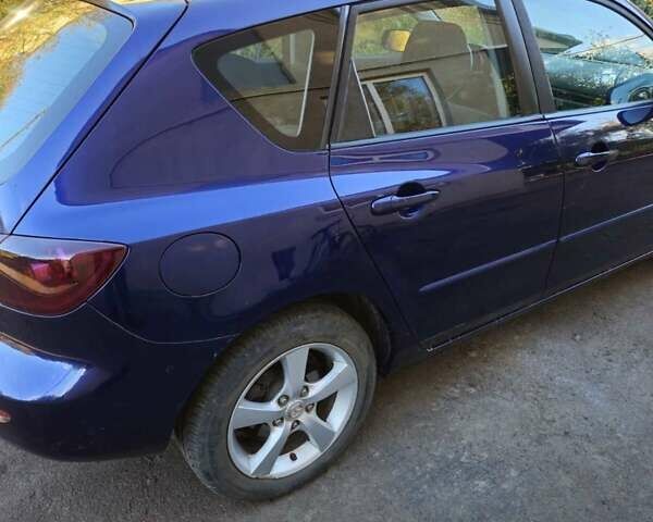 Синий Мазда 3, объемом двигателя 1.6 л и пробегом 220 тыс. км за 3750 $, фото 5 на Automoto.ua