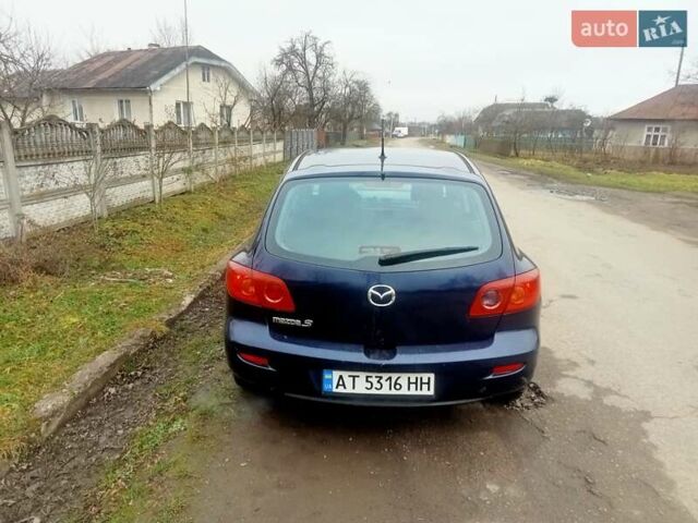 Синій Мазда 3, об'ємом двигуна 1.35 л та пробігом 260 тис. км за 2500 $, фото 3 на Automoto.ua