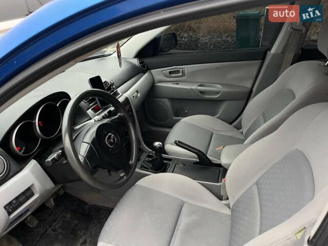 Синий Мазда 3, объемом двигателя 1.35 л и пробегом 182 тыс. км за 3400 $, фото 13 на Automoto.ua