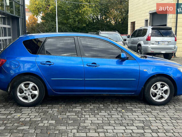 Синий Мазда 3, объемом двигателя 1.35 л и пробегом 182 тыс. км за 3900 $, фото 7 на Automoto.ua