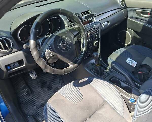 Синій Мазда 3, об'ємом двигуна 2 л та пробігом 220 тис. км за 4000 $, фото 5 на Automoto.ua