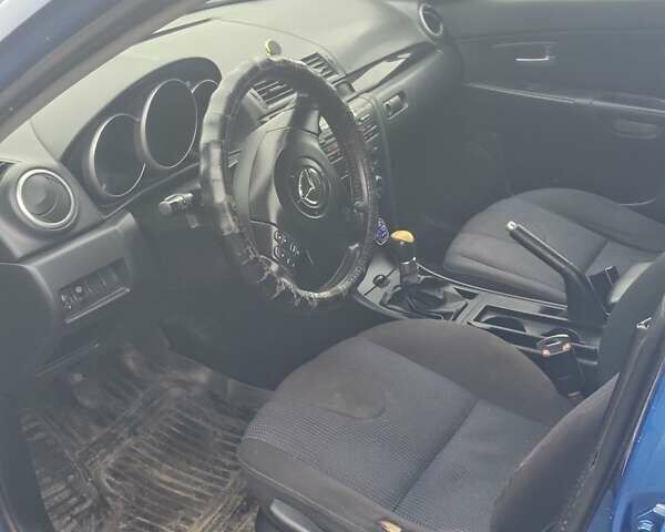 Синій Мазда 3, об'ємом двигуна 1.6 л та пробігом 372 тис. км за 4600 $, фото 4 на Automoto.ua