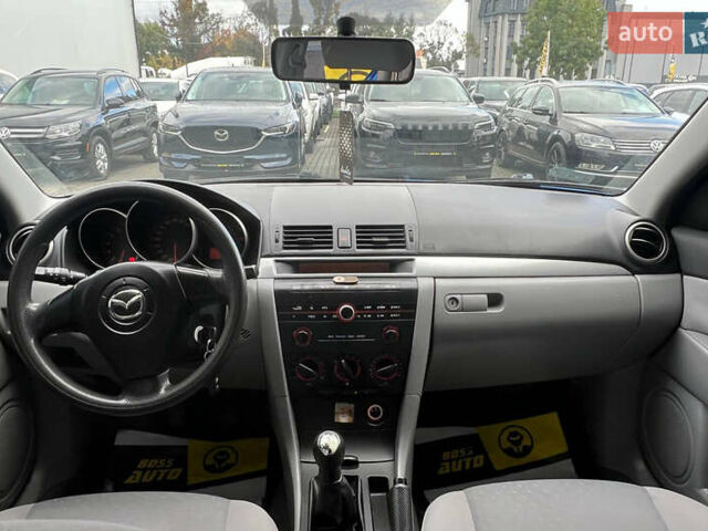 Синий Мазда 3, объемом двигателя 1.35 л и пробегом 182 тыс. км за 3900 $, фото 13 на Automoto.ua