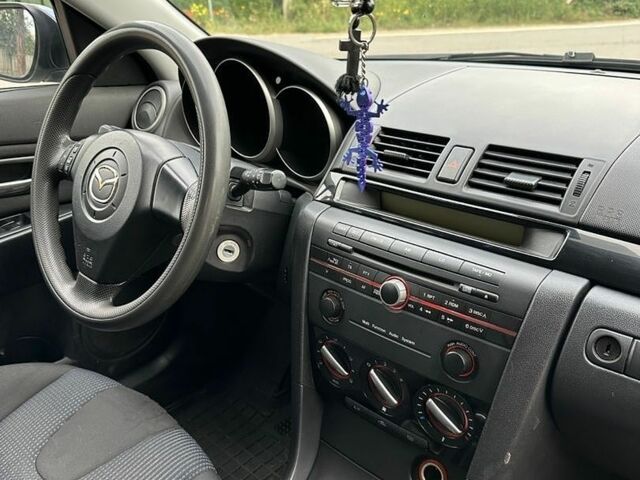 Синий Мазда 3, объемом двигателя 1.56 л и пробегом 440 тыс. км за 3200 $, фото 9 на Automoto.ua