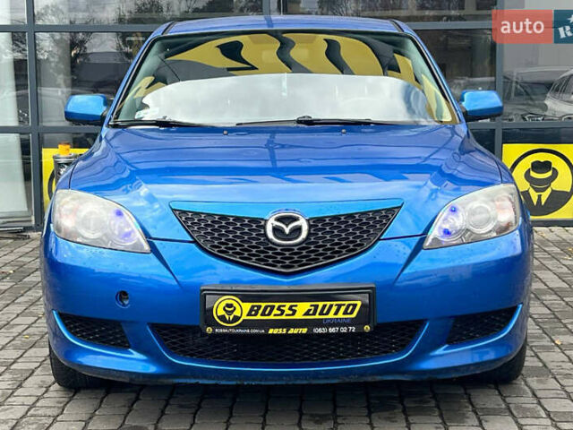 Синий Мазда 3, объемом двигателя 1.35 л и пробегом 182 тыс. км за 3900 $, фото 1 на Automoto.ua