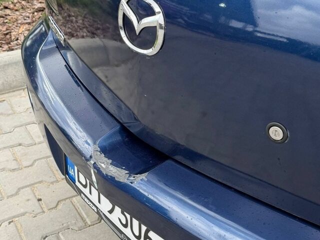 Синий Мазда 3, объемом двигателя 1.6 л и пробегом 246 тыс. км за 4200 $, фото 2 на Automoto.ua