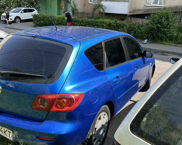 Синий Мазда 3, объемом двигателя 1.35 л и пробегом 170 тыс. км за 3900 $, фото 4 на Automoto.ua