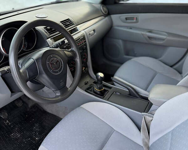 Синий Мазда 3, объемом двигателя 1.3 л и пробегом 222 тыс. км за 2500 $, фото 8 на Automoto.ua