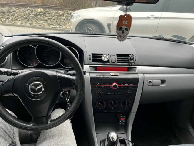 Синий Мазда 3, объемом двигателя 1.3 л и пробегом 182 тыс. км за 2900 $, фото 15 на Automoto.ua